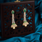 A.D gold green pearl jhumkas